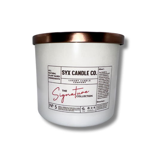 No. 5 luxury candle with tropical kiwi, peach, jasmine, and sugar blossom notes, made with soy and coconut wax and two cotton wicks